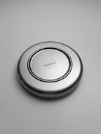 Oval stainless steel SOLIS plate with smooth polished finish, shown upside down.