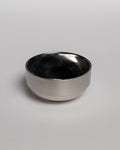 Round stainless steel bowl with polished interior and brushed exterior finish.